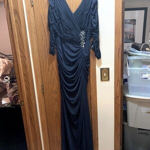Beautiful, black long-sleeved ruched gown by Adrianna Papell.  New with tags.